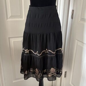 Ann Taylor LOFT black embroidered and beaded tiered skirt.